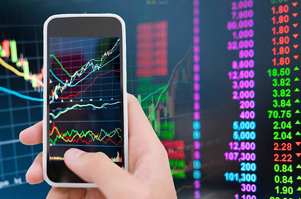 istock Asian Businessman using a smart phone analysis stock 607255618