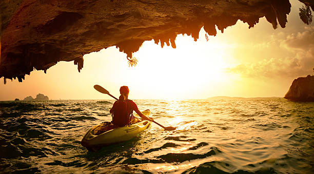 istock Young lady paddling the kayak 607258294
