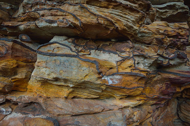 istock Natural colorful rock background, closeup texture 607258554