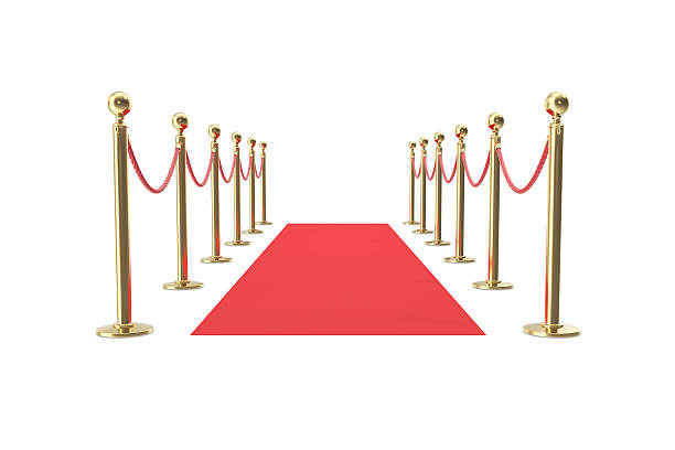 istock Red velvet carpet in studio with gold barrier. 3d illustration 607259020