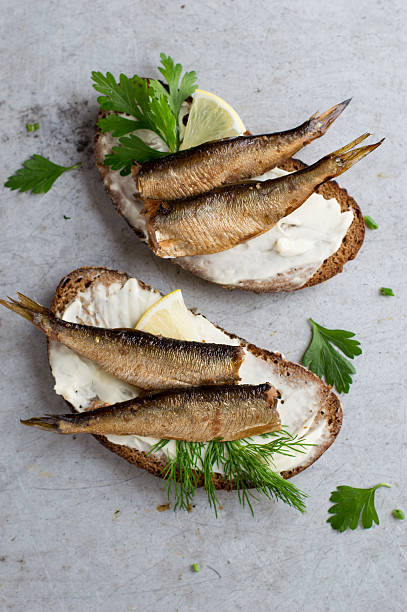 istock Sandwiches with sprats or sardines 607259026