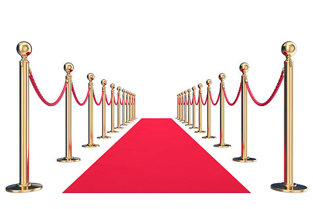 istock Red velvet carpet in studio with gold barrier. 3d illustration 607259182