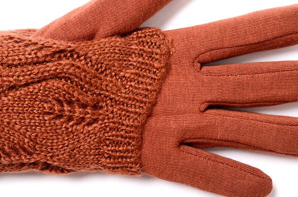 istock gloves orange color isolated on white 607260820
