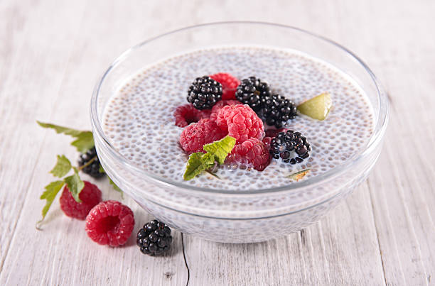chia pudding with berry fruit chia pudding with berry fruit christmas pudding stock pictures, royalty-free photos & images