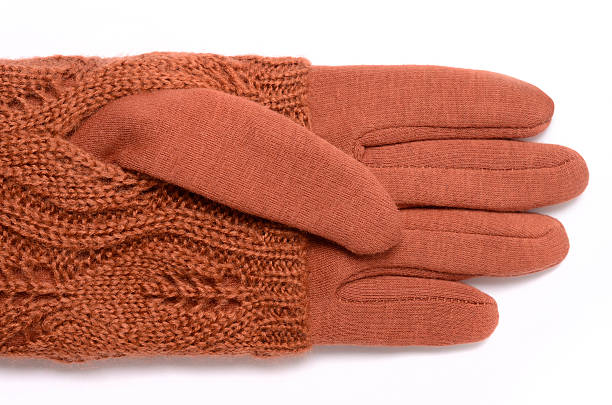 istock gloves orange color isolated on white 607261288