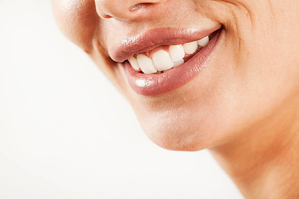 istock Beauty young woman lips 607261560
