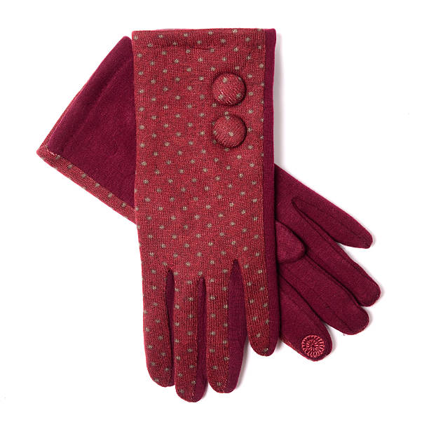 istock women's gloves with polka dots isolated on white 607261756