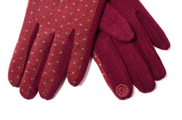 istock women's gloves with polka dots isolated on white 607262570
