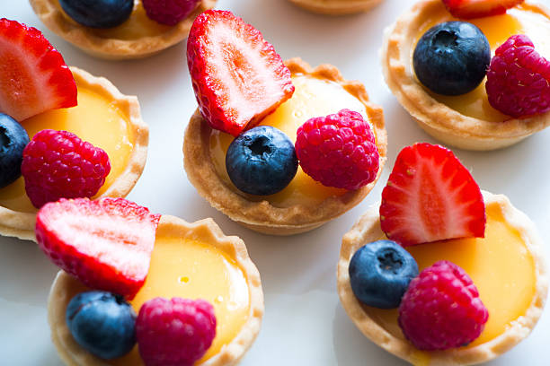 istock Tartlets with cream and fres berries 607264972