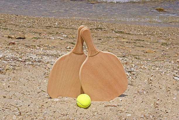 istock Set for a game of beach tennis 607265566