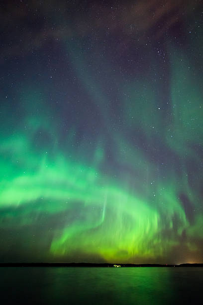 istock Northern lights over lake in finland 607266260
