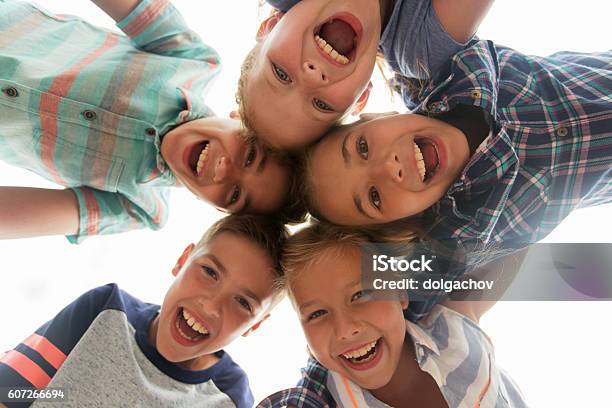 Group Of Happy Children Faces In Circle Stock Photo - Download Image Now - Child, Circle, Group Of People