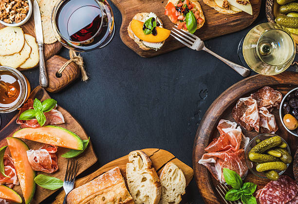 istock Italian antipasti wine snacks set over black grunge background 607267692