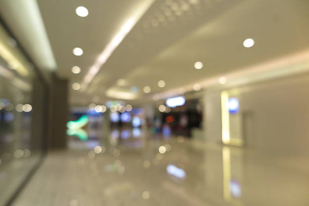 istock Abstract shopping plaza mall interior, modern market, blur background 607269718
