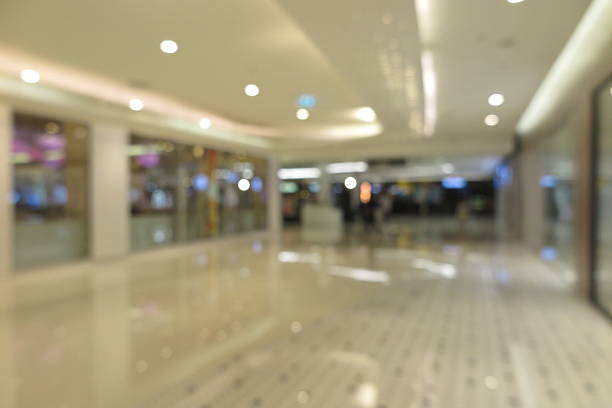 istock Abstract shopping plaza mall interior, modern market, blur background 607269754
