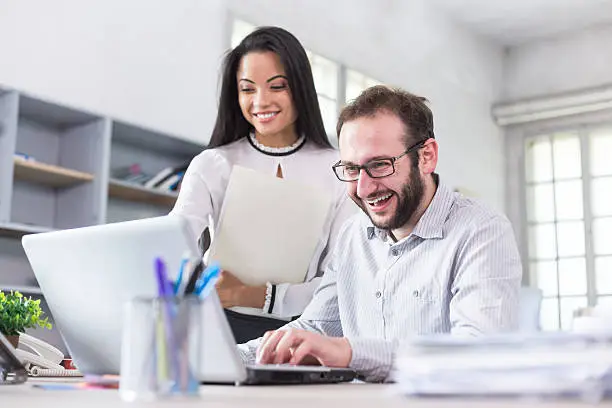 Photo of Excited young people at the work