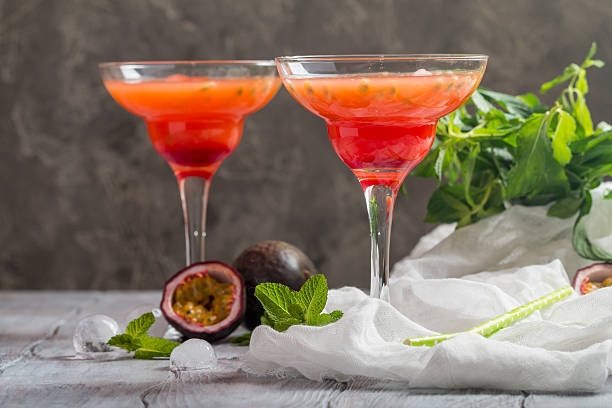 istock Alcoholic cocktail with fresh passion fruit 607271940