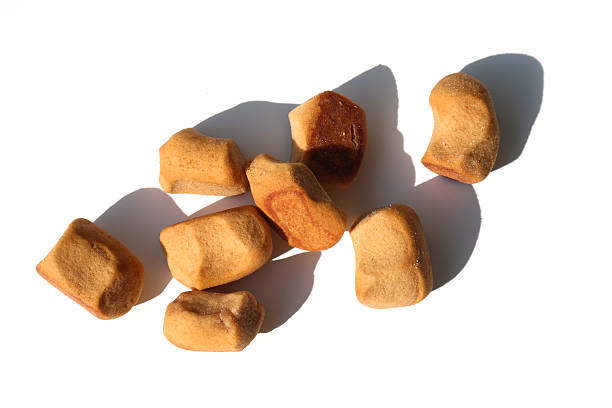 istock Peppernuts (pepernoten), a Dutch holiday/Sinterklaas snack, on white 607274342