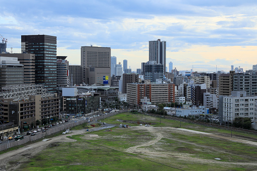 Osaka,Japan - September 17, 2016: Vast vacant lot on the north side of JR Osaka Station, was the station of the former freight train. This broad vacant lot are adjoining  a maximum of downtown of Kansai as known as \