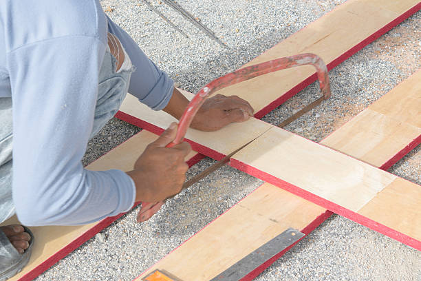istock Mason preparing formwork in wood to build a terrace.Carpenter sa 607279310