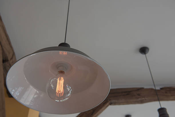 istock Vintage Hanging lamp  decor. Edison lamp. In the room 607279574
