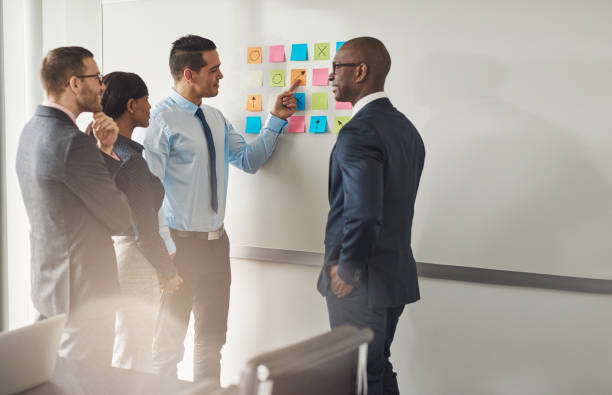 istock Group of multiracial businesspeople chatting 607281864