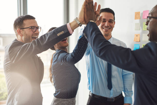 istock Happy successful multiracial business team 607282178
