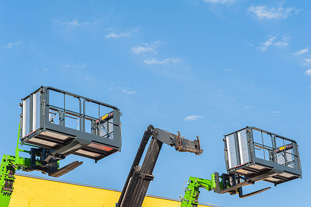 istock Aerial working platform, buckets and forklift telescopic boom. 607282290