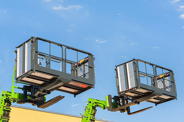 istock Aerial working platform, buckets and forklift telescopic boom. 607282694