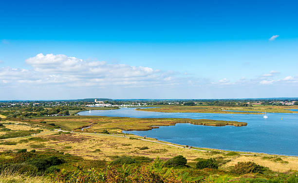 Christchurch Harbour Hengistbury Head in Bournemouth and Christichurch Harbour - a popular tourism destination. christchurch england photos stock pictures, royalty-free photos & images