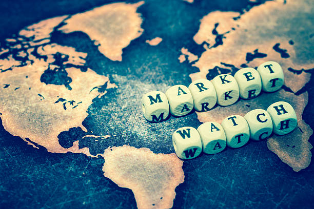 istock MARKET WATCH on grunge world map 607285190