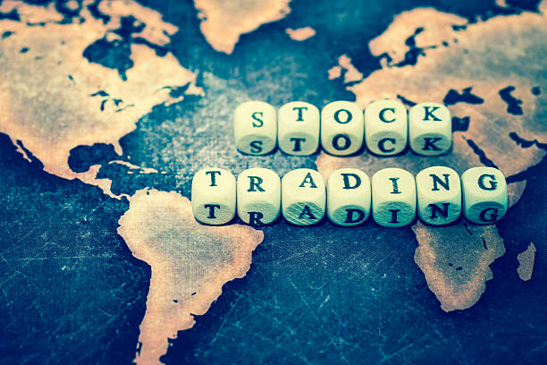 istock STOCK TRADING on grunge world map 607285400