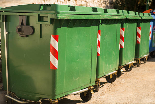 istock Colorful recycle bins on the street 607285504