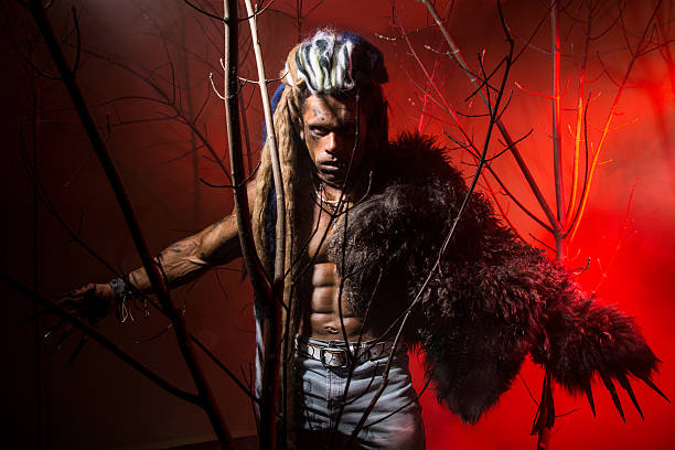 istock Strong scary werewolf with long nails in the wood. 607287192