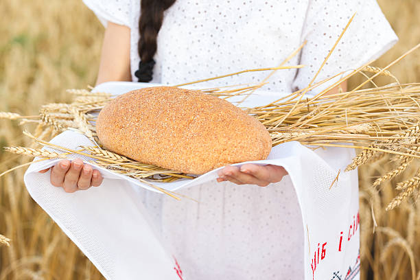 istock girl in wheat field 607290816