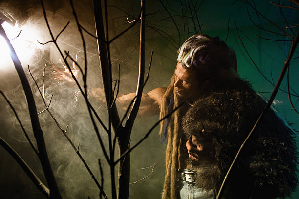 istock Muscular man with skin and dreadlocks 607293536