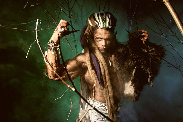 istock Muscular man with dreadlocks and skin through 607295448