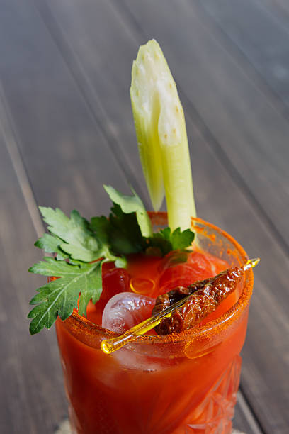 istock Bloody mary cocktail garnished with celery, popular alcohol drink 607295890