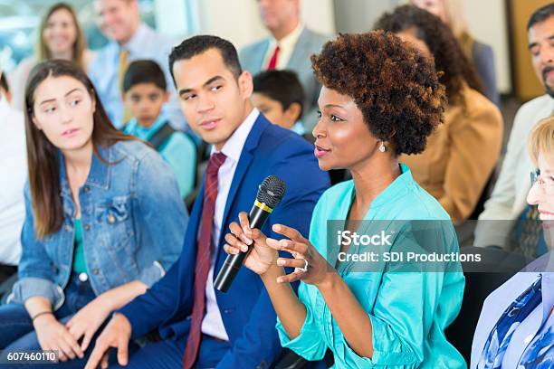 Confident African American Woman Asks Question During A Meeting Stock Photo - Download Image Now
