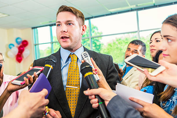 istock Confident political candidate talks with the press 607460254