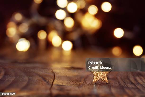 Christmas Background With Stars And Bokeh Stock Photo - Download Image Now - Christmas, Backgrounds, Table