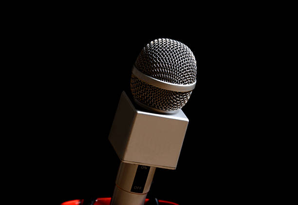Microphone for sound, speech, motivational speaker on black.
