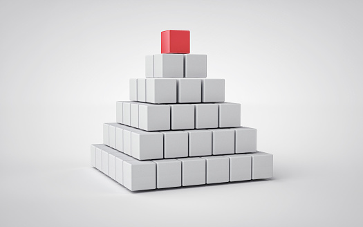 Pyramid made of gray cubes with different red cube on top. 3D Render