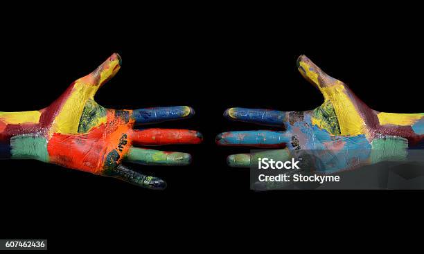 Two Multi Color Painted Hands Coming To Each Other Stock Photo - Download Image Now - Contact Us, Fun, Creativity