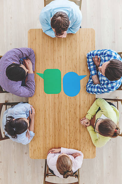 istock Businessteam working at meeting table 607463420