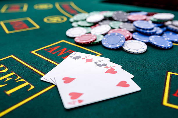 istock Poker chips on a  table at the casino 607466178