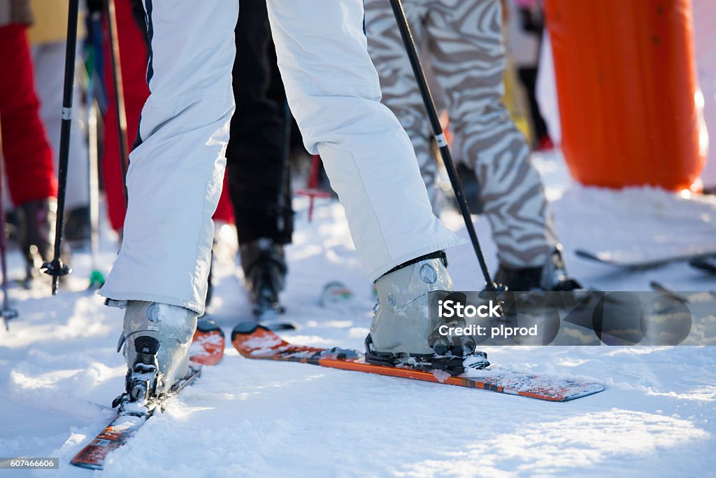 close-up of ski boots on skis close-up of ski boots on skis in a queue in the snow Ski Lift Stock Photo