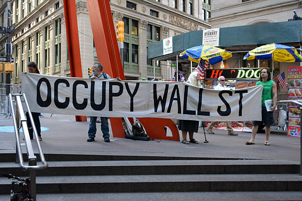 New York, New York - September 16, 2016: Protesters gathered at Zuccotti Park to mark the fifth anniversary of the start of the Occupy Wall Street movement in Lower Manhattan in New York City in 2016.