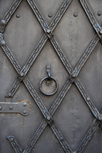 istock Part of an antique metallic door 607468268