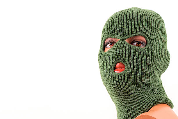 istock Green balaclava mask on manikin's head 607471502